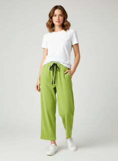 lime green sweats with heart detail on pocket