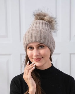 women's toque with pom pom