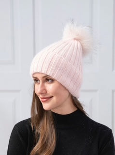 women's toque with pom pom