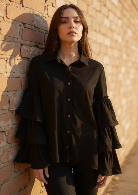 black blouse with ruffle sleeves