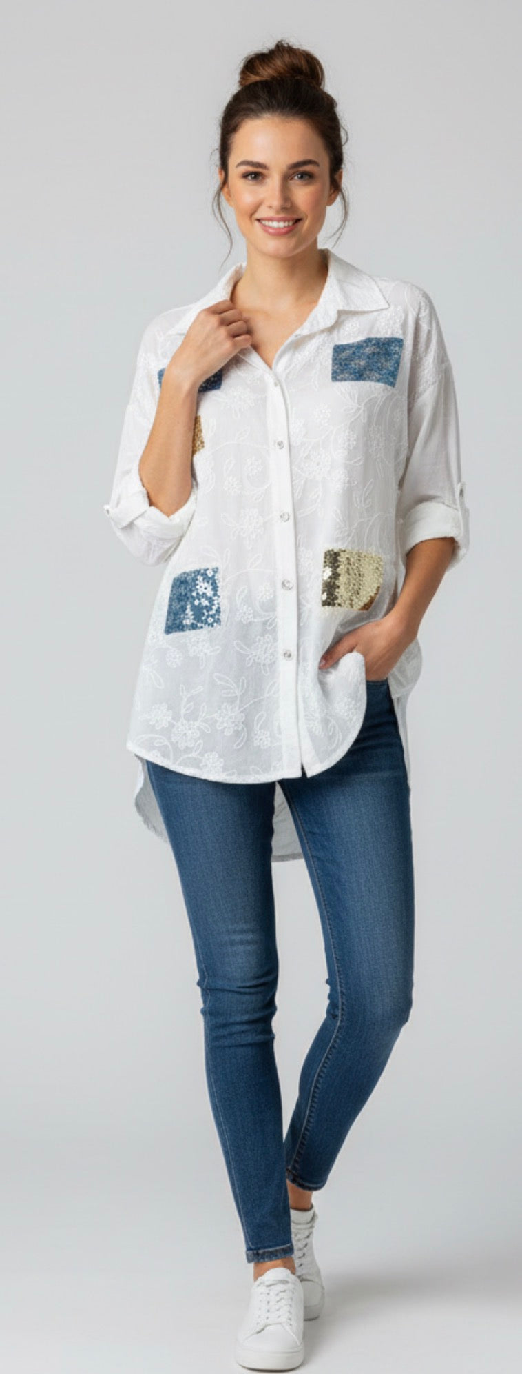 white blouse with sequence patch