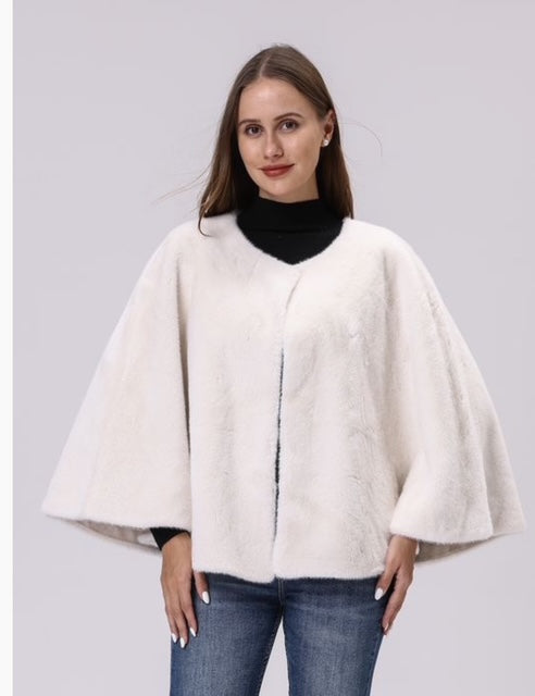 white faux fur jacket