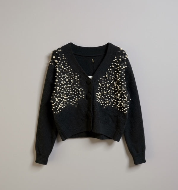 black cardigan with pearls
