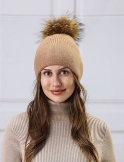 women's toque with pom pom