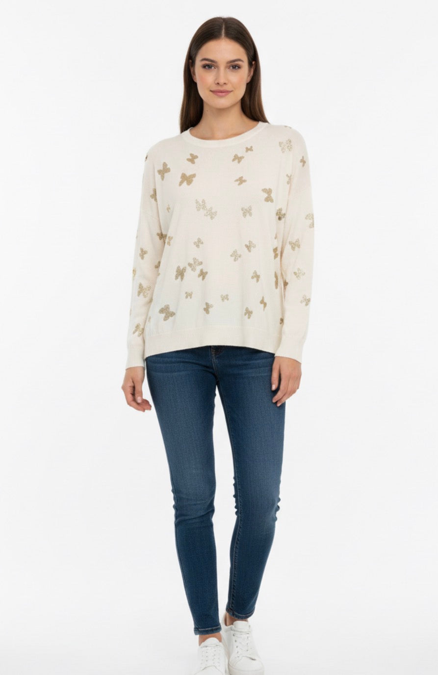 white sweater with gold metallic butterfly