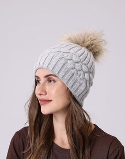 women's toque with pom pom
