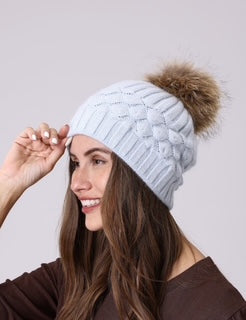 women's toque with pom pom