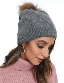 women's toque with pom pom