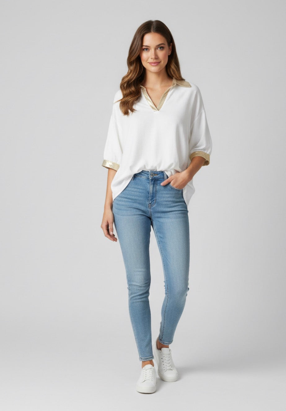 white blouse with gold trim