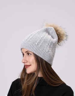 women's toque with pom pom