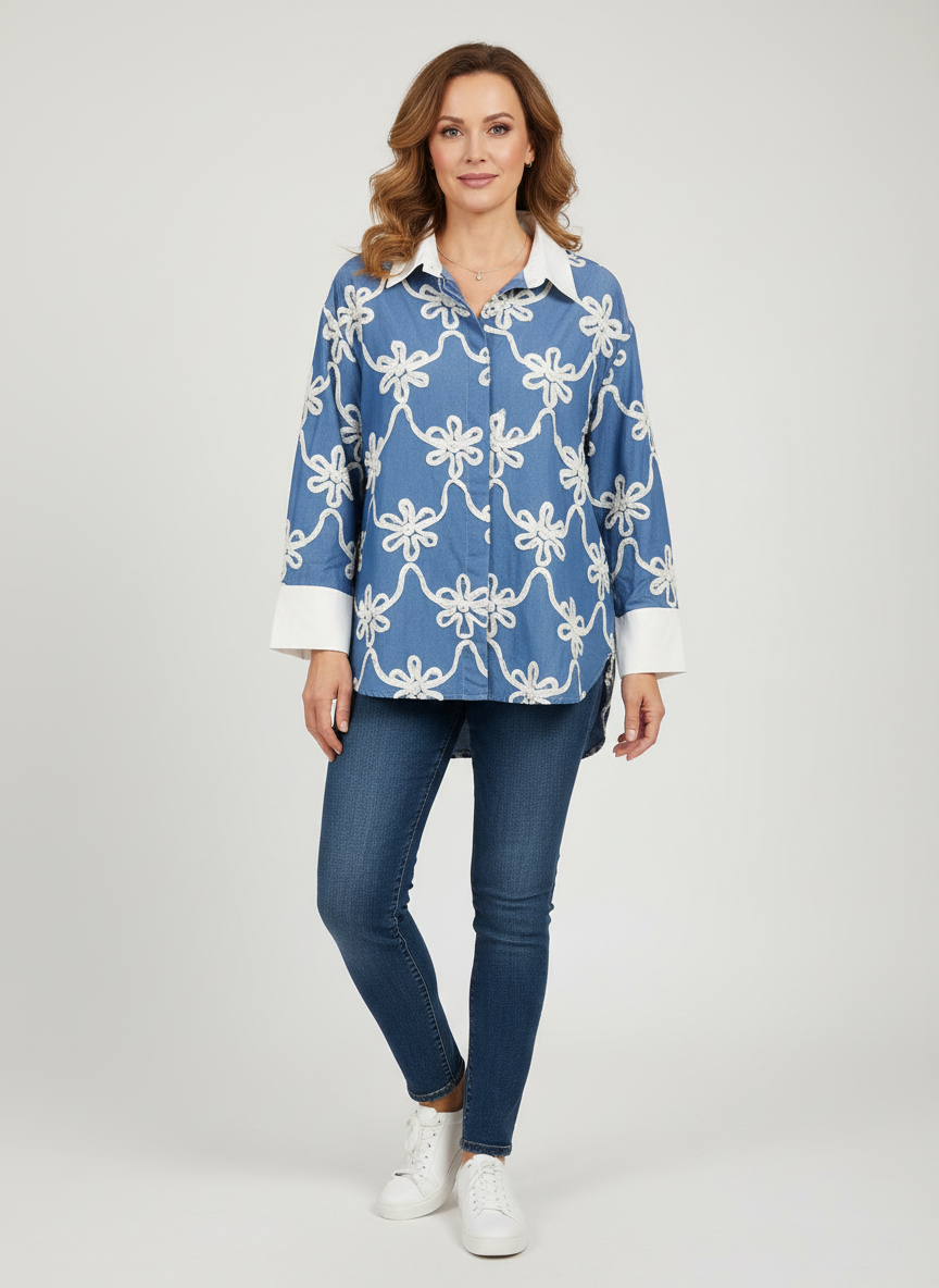 A classic blue asymmetric dress shirt with white cuff