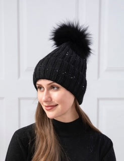 women's toque with pom pom