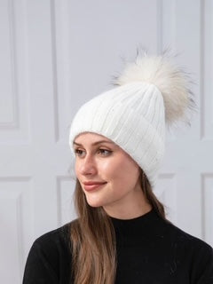 women's toque with pom pom