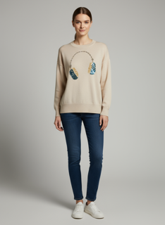beige sweater with headphone design