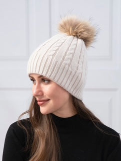 women's toque with pom pom