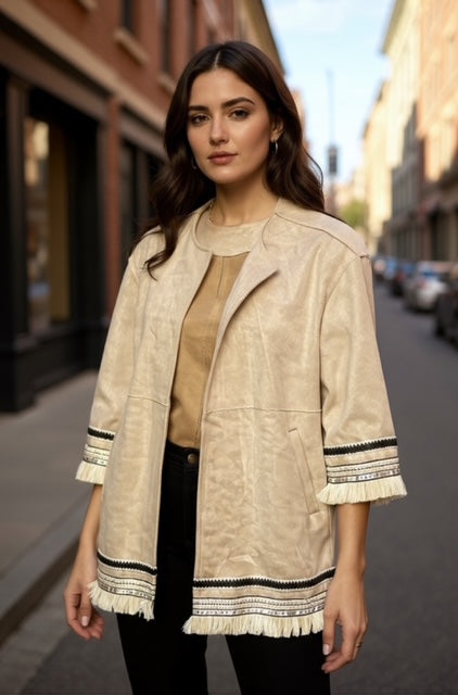beige jacket with frills
