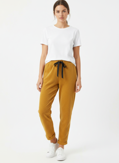 mustard sweats with heart detail on pocket