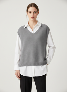 grey vest with white blouse