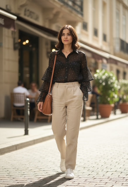 black blouse with ruffle sleeves and gold sparkle