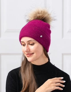 women's toque with pom pom