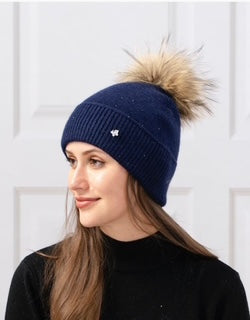 women's toque with pom pom