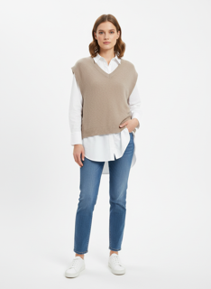taupe vest with white blouse