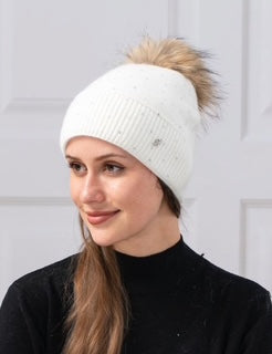 women's toque with pom pom