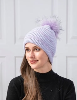 women's toque with pom pom