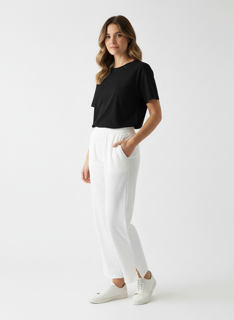 white jogging pants with circle details