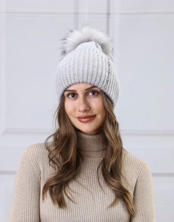 women's toque with pom pom