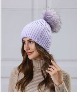 women's toque with pom pom