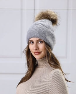 women's toque with pom pom