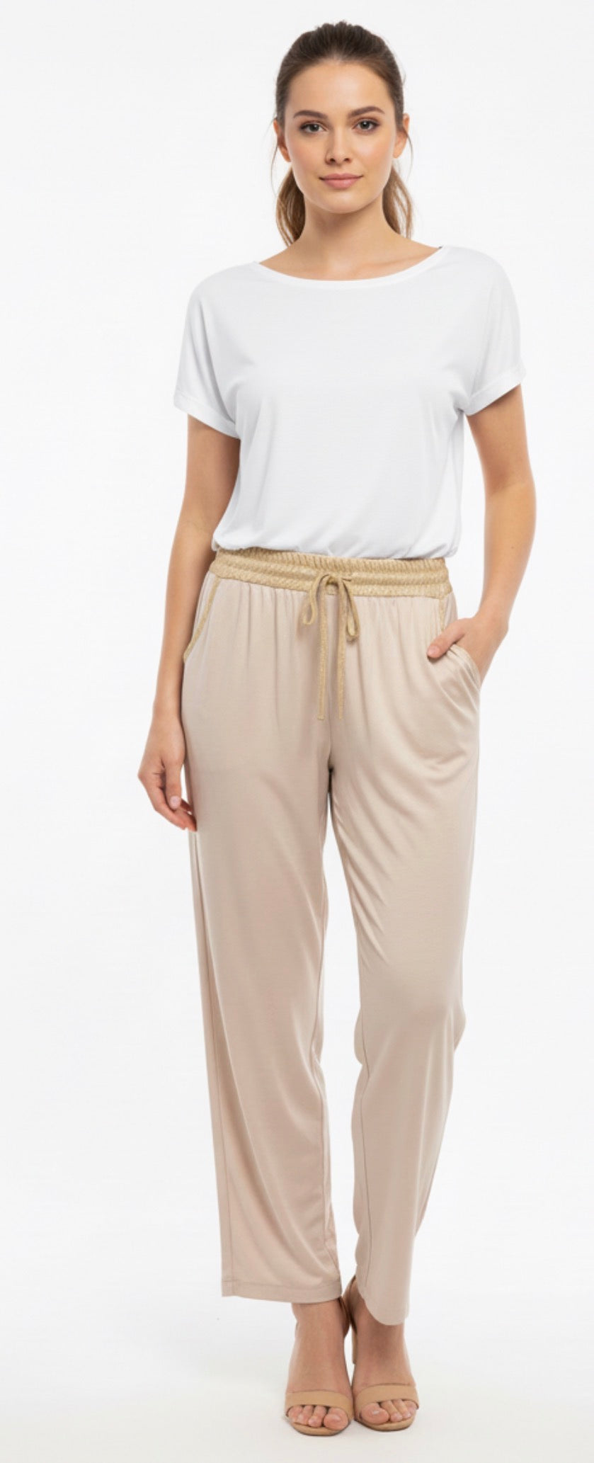 beige metallic sweats with gold trim