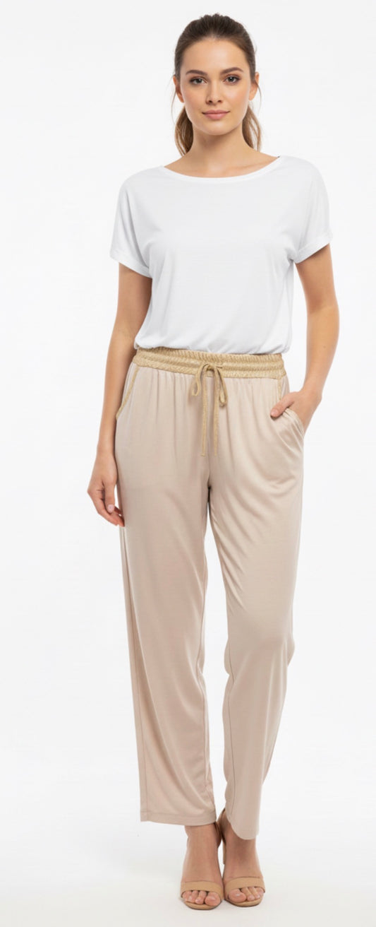beige metallic sweats with gold trim