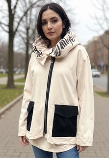 beige hoodie with black pockets