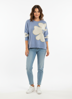 light blue sweater with flower design