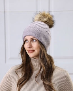 women's toque with pom pom