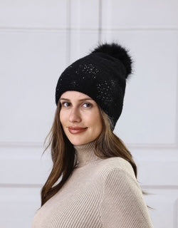 women's toque with pom pom