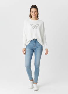 white knit top with butterfly