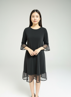 black dress with transparent trim