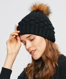 women's toque with pom pom