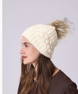 women's toque with pom pom