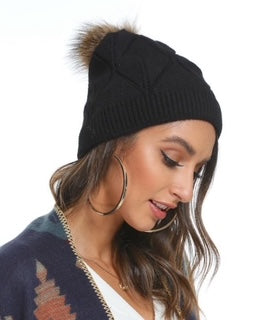 women's toque with pom pom
