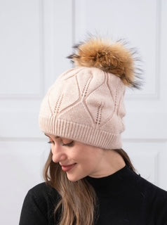 women's toque with pom pom