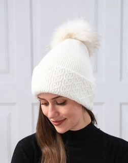 women's toque with pom pom