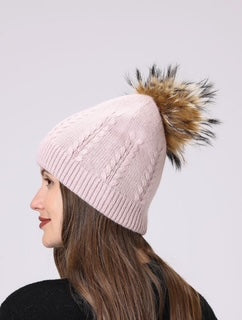women's toque with pom pom