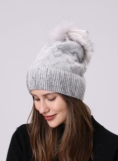 women's toque with pom pom