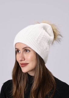 women's toque with pom pom