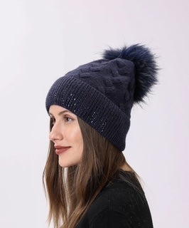 women's toque with pom pom