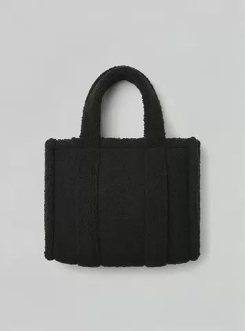 A black teddy borg bag